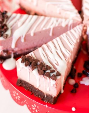 This deliciously rich and creamy no-bake Raw Vegan Peppermint Cheesecake is creamy without the cream cheese, fluffy without the eggs, and secretly sugar free and gluten free too!  No baking required, no water bath needed. Perfect for the holidays, birthdays, parties, or no reason at all!